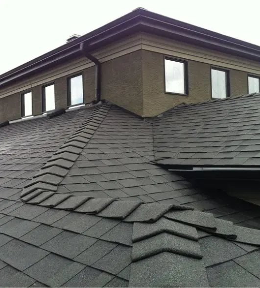 view on a asphalt roof located on 76 Heritage Lake, Calgary