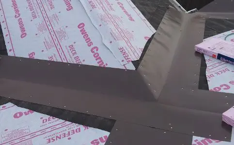 waterproofing membrane laying on a roof