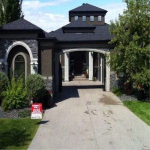 front view of a house in Calgary roofed by National Star Roofing